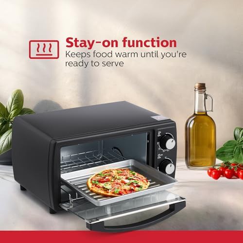 Black compact 4-slice toaster oven with pan — photo 4